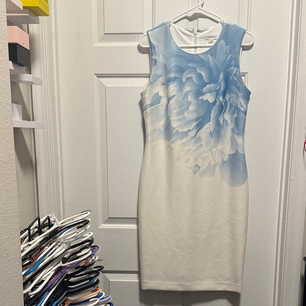 Sleeveless White Dress with Soft Blue Floral Print